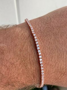 "Super iced out and truly classy looking mens or ladies tennis bracelets. Available in 6\"-8.5\" long 2mm thick 6.5-9 grams depending on length Handmade SOLID 925 Sterling Silver finished in 14k rose gold Real silver underneath so will never tarnish or turn your hand green 3ct simulated diamonds (cz) Secure spring clasp with 2 sided safety clasps!" Classic Iced Out Tennis Bracelet As A Gift, Classic Iced Out Tennis Bracelet For Anniversary, Classic Iced Out Tennis Bracelet For Gift, Classic Iced Out Tennis Bracelet As Gift, Classic Iced Out Tennis Bracelet Gift, Ladies Tennis, Unisex Bracelets, Gorgeous Bracelet, Matching Bracelets