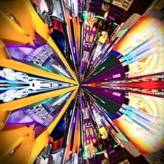 an image of a carnival ride from the top down looking up at it's ferris wheel