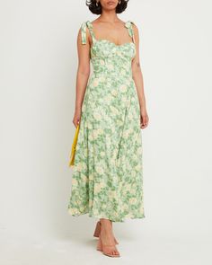 Price Comparison Few Moda $79 Alice + Olivia $268 Zimmermann $318 Product Details The bustier style bodice of this gorgeous gown is finished with pretty tie straps. Done in a romantic floral print.- Back zipper- Adjustable straps- Lined- Content: 100% Polyester Style# T22WDR12443 Fit Notes - Model wearing a size 6- Shoulder seam to hem measures approx 52'' in length - Model measurements: Height: 5'10"" Bust: 36"" Waist: 26"" Hips: 36"" Size Length Bust Waist Hips 0 111 70 - 73 61 118 2 113 72 - Floral Dress Green, Sage Floral Dress, Green Floral Bridesmaid Dresses, Sage Green Floral Dress, Moh Dress, Mismatched Dresses, Bm Dresses, Sage Green Dress, Romantic Floral Print