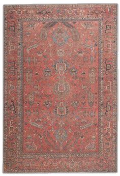 an antique rug with red and blue colors