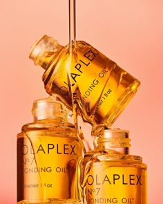 3 bottles of OLAPLEX N°.7 Bonding Oil, Hair Structure, Best Hair Products, Soften Hair, Beauty Products Photography, Products Photography, Product Shoot, Frizz Control, Hair Strengthening