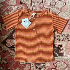 Nwt Kate Quinn Organic Cotton Shirt In Orange Stripes With Buttons. Cute Unisex Summer Shirt, Crew Neck Shirt For Playtime In Summer, Fitted Casual Shirt For Playtime, Striped Tops For Playwear In Spring, Striped Tops For Spring Playwear, Cotton T-shirt For Playwear In Fall, Cute Unisex Tops For Spring, Fall Playtime Tops With Short Sleeves, Fitted Tops For Fall Playwear