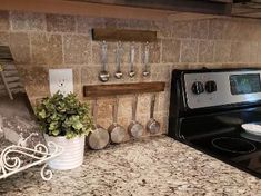 the kitchen counter is clean and ready to be used as a pot holder for cooking utensils