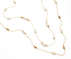 "Layered Elegant White Pearls Beads & 14K Gold-Filled Necklace for Wedding This double-strand necklace is an Elegant, delicate, and romantic necklace, that upgrades everyday moments to a special occasion. Gives you a touch of white color that lights up your face, adorned with round white pearl stones.  The necklace is delicate but stylish, layered, and classical. It gives you a touch of elegance. White Pearls Symbolic qualities: innocence, beauty, sincerity, and new beginnings.  This is what mak Elegant Multi-strand Chain Necklace For Wedding, Elegant Multi-strand Wedding Necklace, Delicate Beaded Necklaces For Formal Occasions, Delicate Beaded Necklace For Formal Occasions, Gold Double Strand Necklace For Wedding, Formal Delicate Beaded Necklace, Elegant Gold Beaded Necklaces For Wedding, Elegant Yellow Gold Beaded Necklaces For Weddings, Double Strand Yellow Gold Necklace For Wedding