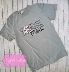 Score a home run in style with our Custom Embroidered Baseball Shirt! Show your love for your kiddos team, by adding their team name or just add "mom" below it . With customizable colors, you'll be the MVP at every game. Swing into action with this unique and personalized shirt! Are you looking for another style or color shirt? I'm happy to help! All items are made to order right here at Lilly Pie Creations Wedding With Kids, Baseball Mom, Baseball Shirts, Monogram Fonts, Team Names, Boys Shirts, Girls Shopping, Birthday Shirts, Workout Shirts