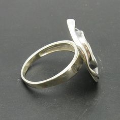 Sterling silver ring, - 925/1000. Stamped 925Approximate weight 6.0 grams. Top width 2.0 cm (0.80 inches). All our jewels are made from solid sterling silver 925/1000 and are carefully crafted by hand in our family workshop. We dispatch your orders in 5 working days, worldwide and the postage is $5. We ship registered priority mail. Please allow 5-7 working days for delivery in Europe and 10-15 working days outside Europe. For any questions - please do not hesitate to contact me! Sterling Silver Swirl Jewelry, Sterling Silver Swirl Jewelry In Silver, Spiral Silver Jewelry For Anniversary, Silver Spiral Jewelry For Anniversary, Silver Sterling Bypass Ring With Polished Finish, Sterling Silver Bypass Ring With Polished Finish As Gift, Silver Sterling Silver Wedding Bypass Ring, Silver Bypass Ring With Polished Finish As Gift, Silver Sterling Wedding Bypass Ring