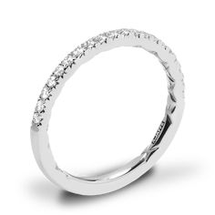 a white gold wedding ring with diamonds on the sides and an open band in the middle