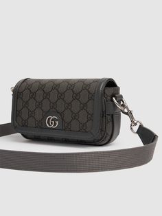 Height: 10cm Width: 18.5cm Depth: 5.5cm. Grey and black GG Supreme canvas . Dark grey leather trim . Brown cotton linen lining . Double G . Inside: 1 zip pocket . Detachable adjustable shoulder strap with 55cm drop . Magnetic snap closure Gucci Ophidia Bag, Gucci Messenger Bags, Gucci Ophidia, Canvas Crossbody Bag, Messenger Bag Men, Brown Bags, Gucci Men, Grey Leather, Blue Bags