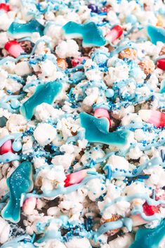 blue and white popcorn with sprinkles on it