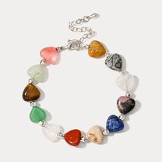 Experience elegance and playfulness with our Natural Stone Heart Beaded Bracelet! This bracelet showcases a stunning array of heart shaped natural stones, each one carefully selected for its unique hue and texture. Each colorful stone is handpicked to inspire unique beauty. Perfect for holidays and beach adventures in a hot summer day. Show your love for nature with this one of a kind piece! DETAILS Materials: Brass, Natural Stones Measurements: Length: 6.69"(17cm)+Extender: 1.57"(4cm) Weight: 1 Heart-shaped Beaded Bracelets With Natural Stones For Gift, Heart-shaped Natural Stone Beaded Bracelets For Gifts, Heart-shaped Natural Stone Beaded Bracelets As Gift, Heart-shaped Natural Stone Beaded Bracelet Gift, Bohemian Crystal Bracelet With Heart Beads, Heart-shaped Gemstone Beads Bracelets For Gift, Heart-shaped Gemstone Beads Bracelets As Gift, Heart-shaped Healing Beaded Bracelets, Heart-shaped Gemstone Beads Bracelet For Gift