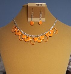 "Bright orange enamel drops make this set stand out nicely.  Shapes include open ovals, rounds and open rounds. Necklace is approx. 18\" and earrings are 1.75\" long." Jewellery Sets, Bright Orange, Jewelry Sets, Orange, Etsy Uk