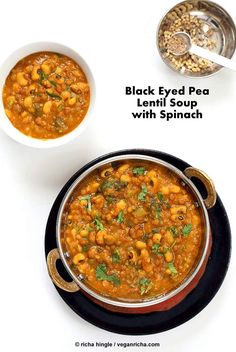 black eyed pea soup with spinach served in a bowl and on a white background