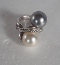 French Vintage Pearls Ring 1930's. Sterling Silver Ring. Very rare and very elegant, antique ring Sterling silver , pearls Ring punch 925 Weight : 7.47 grams or 0.26oz I prepare my shipment as quickly as possible after ordering : Within 1 to 3 business days. Mostly items are sent the day after the purchase. I offer Package tracking. I always pack the items very carefully and safely, usually in eco-friendly recycled packages. Customer satisfaction my major concerns , if you have any questions abo Elegant Formal Multi-stone Pearl Ring, Vintage Multi-stone Pearl Ring For Formal Events, Vintage Multi-stone Pearl Ring For Formal Occasions, Classic Multi-stone Pearl Ring For Formal Occasions, Elegant Silver Bypass Ring For Formal Events, Elegant Silver Bypass Ring For Formal Occasions, Silver Hallmarked Pearl Ring For Formal Occasions, Formal Silver Pearl Ring Hallmarked, Formal Silver Pearl Ring With Hallmark