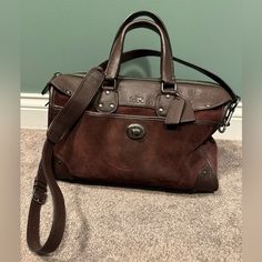 Beautiful Coach Suede Rhyder Bag! Gently Used And Ready For Lots Of More Wear! This Oxblood Color Is Stunning. See Pics The Bag Is In Fantastic Shape. 13” Length, 9”Height, 7.5” At The Base. This Has A Crossbody Strap Too Plus The Handles I Love That Combination. Offers Welcome And Check Out My Closet! If You Love Coach I Have A Ton In There. Oxblood Color, Bags Coach, Coach Me, If You Love, Crossbody Strap, Devon, Coach Bags, Handles, Bag Lady