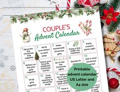 a printable christmas calendar for couples with candy canes and candies on the table