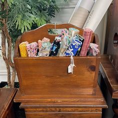 an old wooden piano with various items in it