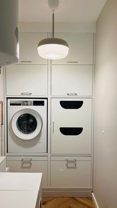 a washer and dryer in a small room