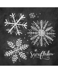 snowflakes drawn on a blackboard with white chalk