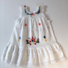 Nwot Never Worn Beautiful Toddler Dress. Size 2. No Brand Tag As Likely Hand Made. White With Multi Colored Embroidery. Crochet Top And Straps, Lace Edges. Gorgeous Detail. Perfect Condition. Laid Flat Shoulder To Hem Measurement Is 19”. Pit To Pit 11” Embroidery Crochet, Lace Edges, Lace Edging, Brand Tags, Toddler Dress, Embroidered Dress, No Brand, Kids' Dresses, Multi Colored