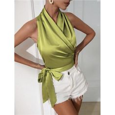 Elevate Your Look With This Chartreuse Green Satin Crop Top, Designed To Make A Statement. The Halter Neckline And Knot Wrap Detail Create A Flattering, Slim Fit That Highlights Your Shape. Sleeveless And Made From Non-Stretch Satin, It Offers A Smooth, Polished Finish. With No Sheer Elements, This Crop Top Is Both Stylish And Versatile, Perfect For Pairing With High-Waisted Bottoms Or Layering Under A Blazer. Green Cami Blouse For Spring, Spring Party Blouse With Halter Neck, Chic Green Tank Blouse, Casual Halter Neck Party Blouse, Green Halter Neck Top For Party, Chic Green Sleeveless Tank Top, Sleeveless Summer Blouse For Night Out, Chic Green Tank Top For Night Out, Fitted Green Tank Blouse