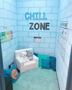 there is a room with blue walls and green carpeted flooring that says chill zone