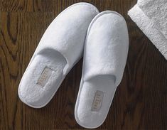 Bring home the essential Frette Slippers made for The Luxury Collection. Our white open back slippers are made with a plush velour while maintaining lightweight breathability. Featuring a classic design slip on the inviting softness of our slippers every night. Luxury Hotel Spa, Ritz Carlton Hotel, Spa Slippers, Luxury Collection Hotels, White Slippers, The Ritz Carlton, Spa Essentials, Luxury Towels, Hotel Collection