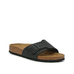 Birkenstock-Catalina Sandal - Women's Slip on the casual Catalina sandals from Birkenstock to complete your summer wardrobe. This pair features a classic slide silhouette, complete with a large strap and a contoured footbed for comfort and support. Classic Summer Footbed Sandals For Vacation, Classic Footbed Sandals For Summer Vacation, Classic Flat Sandals For Vacation, Classic Slide Sandals With Buckle Closure, Classic Flat Footbed Sandals For Spring, Classic Summer Sandals With Round Toe, Classic Round Toe Sandals For Summer, Classic Flat-heel Sandals For The Beach, Classic Slide Footbed Sandals For Spring