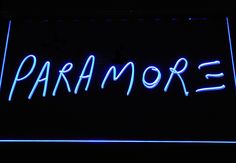 a neon sign that says paramoree in blue lights on a black background with the word paramoree underneath it