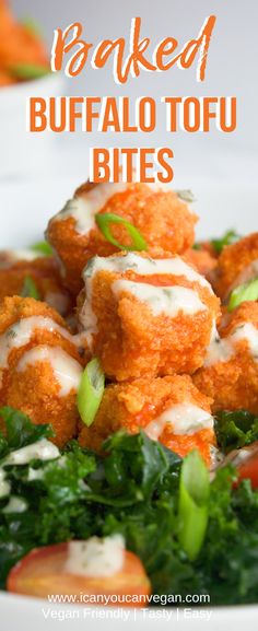 baked buffalo tofu bites on a plate with spinach