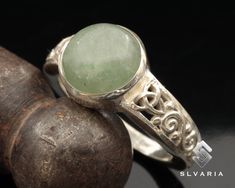 Natural Green Aventurine Crystal Triquetra Design Handmade Ring Top Quality 925 Sterling Silver Ring Round Gemstone Libra Ring Trust Stone 💍Item Details💍 SKU CODE: IT3D10022 ★ Material: 925 Sterling Silver ★ Silver Weight: App. 4.85 Grams {6 USA Size} ★ Ring Wide: 0.27-0.6 mm ★ Ring Size: Available in variations  ★ Gemstone: Natural Green Aventurine ★ Gemstone Size: 10mm ★ Gemstone Shape: Dome ★ Ring Plate: Available in variations to Rose Gold & 24K Gold & Black Oxided 💎ABOUT GEMSTONE💎    Amethyst is a powerful and protective stone. Amethyst is a natural tranquiliser, it relieves stress and strain, soothes irritability, balances mood swings, dispels anger, rage, fear and anxiety.  Alleviates sadness and grief, and dissolves negativity.  Amethyst activates spiritual awareness, opens int Round Aventurine Ring, Aventurine Gemstone Ring Jewelry, Triquetra Design, Libra Ring, Growing Crystals, Hematite Crystal, Green Aventurine Crystal, Ring Plate, Wedding Ring For Her