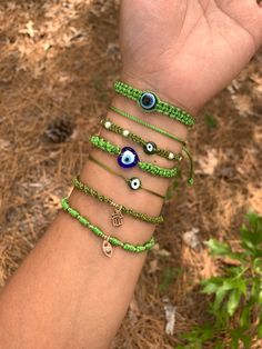 Minimalist olive green and green bracelets 😍 Materials: resin eye, nylon #2 and nylon #18, 18k gold plated beads, 14k gold plated hamsa hand/evil eye, glass pearls, glass flat evil eye and glass heart evil eye.  All bracelets are size 6 inches - 10' when fully open.  💕 Most of my bracelets are 1/2 cm wide(thick) some are 1 cm. 💕 Sliding knot closure and completely adjustable. Message me with any questions or different sizing prior to purchase 💕.  Remember that handmade pieces are always unique and they never look exactly the same 🤩 that's why they are so special 😍😉. ️🎁 Follow  me on Instagram  and Facebook for giveaways, special offers and discounts   @roxysshop2021 🧿💎Jewelry Care💎🧿 If your bracelet is made of gold/silver plated beads or any metal beads and charms please follow Green Spiritual Jewelry With Adjustable Cord, Green Beaded Bracelets With Evil Eye For Gift, Green Beaded Evil Eye Bracelet For Gifts, Adjustable Green Macrame Jewelry, Green Spiritual Evil Eye Bracelet As Gift, Adjustable Green Evil Eye Bracelets, Adjustable Green Evil Eye Bracelet, Green Beaded Bracelets With Adjustable Cord For Friendship, Green Beaded Evil Eye Bracelet Gift