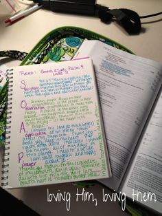 an open notebook sitting on top of a desk