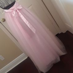 Nwot...Beautiful Soft Cotton Candy Pink Tulle Skirt...Fully Elastic Waist..Satin Ribbon Tie...Size Small..Maxi Length...This Is Very Soft Tulle...Great For Photo Shoots On Beach..Wedding..Etc...Gorgeous Color!!! Brand New Pink Satin Long Skirt, Pink Satin Skirt For Party, Pink Satin Party Skirt, Elegant Pink Prom Skirt, Pink Full Skirt Bottoms For Wedding, Pink Skirt For Spring Prom, Spring Prom Pink Skirt, Spring Pink Prom Skirt, Pink Spring Prom Skirt