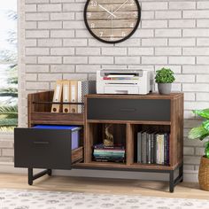 a clock mounted to the side of a white brick wall next to a book shelf