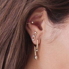 14k gold short curved bar stud earrings with three prong set round diamonds set below each barSPECIFICS • earring is approx. 12mm across• curved bar is approx. 10mm long• round diamonds are approx. 2mm each• white diamonds .18 ctw (pair), .09 ctw (single)• sold as a pair or single Round Diamond Setting, Curved Bar, Gold Shorts, Bar Stud Earrings, Bar Studs, Princess Diamond, Pear Diamond, Pear Shaped Diamond, Huggie Hoop Earrings