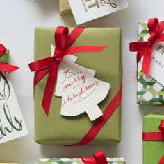 presents wrapped in green paper with red ribbons