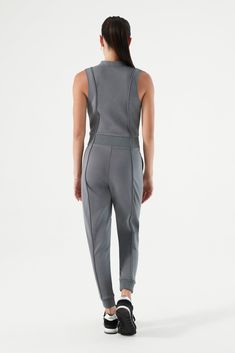 If you’re looking for a one-piece wonder that’s both functional and fabulous, the Sleek Velocity Jumpsuit is here! Designed for active women who crave style and comfort, this comfortable jumpsuit brings together high-quality activewear and fashion-forward vibes in one sleek look. Whether you’re hitting the gym or hanging out, this women’s fitness jumpsuit has you covered! Why You’ll Fall in Love with This Jumpsuit: Ultra-Soft, Sleek Fabrication: Made from high-quality, super-soft materials, this Athleisure Jumpsuits And Rompers For Loungewear, Athleisure Loungewear Jumpsuits And Rompers, Fitted Athleisure Jumpsuits And Rompers For Loungewear, Fitted Sleeveless Jumpsuits And Rompers For Lounging, Athleisure Essentials, Sweat Joggers, Jogger Shorts, Front Zipper, Athleisure