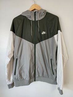 Nike Sportswear Windrunner Hooded Jacket Size 2XL Beige Dark Gray Men's 727324 004 New. Nike Azul, Windbreaker Jacket, Nike Sportswear, Nike Jacket, Hooded Jacket, Dark Gray, Rain Jacket, Cool Outfits, Outfit Ideas