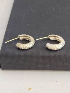 These  are sterling silver delicate earrings. Small  hoop earrings. Textured earrings. Its a great gift for women and teens. Great present for the holidays or for yourself. great bridal and wedding earrings.-Sterling silver-Free shipping worldwide-All my jewelry are sent in a gift boxTo see more of my hoops, please follow this link: https://www.etsy.com/your/shops/TamyZurTachshit/tools/listings/section:25644741,stats:trueTo see more of my Earrings. please follow this link:https://www.etsy.com/il Small Hoops Earrings, Real Gold Hoop Earrings, Earrings Small Hoops, Hippie Chic Jewelry, Textured Earrings, Earrings Small Hoop, Wedding Hoop, Large Silver Hoop Earrings, Handmade Hoop Earrings