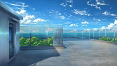 an empty balcony overlooking the ocean with blue skies and white clouds in the sky above