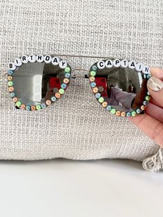 These sunglasses are unique, stylish and just the perfect gift! The heart-shaped design makes them so cute and trendy.  If you would like them customized just message me.  Possible options you might like: hello forty, fifty and fab, 21 and fun, newly 21, 30 and flirty, birthday queen, birthday babe, birthday gal, this is 40, 21 and thirsty, cheers to 21 years, etc. Check the images to see other possible sayings or you can always create your own.  Return Policy: As these sunglasses are customized Summer Party Aviator Sunglasses, Party Aviator Sunglasses With Tinted Lenses, Party Aviator Sunglasses With Tinted Glass Lenses, Trendy Handmade Sunglasses For Gift, Trendy Handmade Sunglasses Perfect As A Gift, Trendy Glass Aviator Sunglasses For Parties, Trendy Handmade Sunglasses As A Gift, Trendy Handmade Sunglasses As Gift, Party Aviator Sunglasses With Uv Protection