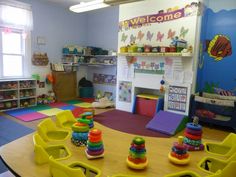 a child's play room with toys on the floor