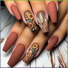 A rustic nail design with a matte terracotta base. Accent nails feature hand-painted wheat stalks and sunflowers, with subtle shading and detail to create a lifelike effect. This design celebrates the abundance of the fall harvest. Thanksgiving Nail Designs, Thanksgiving Nails, Halloween Nail Designs, Fall Nail Art, Fall Nail Colors, Simple Nail Designs