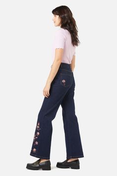 Paisley embroidered flare jean- ornamental paisley swirls embroidered on leg hem and back pockets- a trendy flare fit for this season in a rich dark denim- high rise style- front fly with button closure- side and back pockets- comfortable cotton elastane blend- available in dark denim Product Code: PGFX017 Embroidered Mid-rise Flare Jeans For Fall, Mid-rise Embroidered Flare Jeans For Fall, Fall Embroidered Denim Flare Jeans, Embroidered Denim Flare Jeans For Fall, Spring Dark Wash Cotton Flares, Spring Embroidered Wide Leg Flare Jeans, Embroidered Wide Leg Flare Jeans For Spring, Denim Blue Floral Embroidery Wide Leg Jeans, Embroidered Wide Leg Denim Blue Jeans