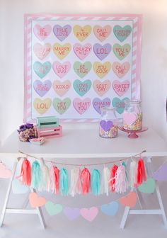 a white table topped with lots of hearts