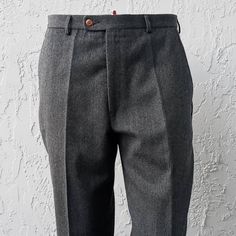 Calvin Klein Flat Front 100% Pure Wool Gray Luxury Trouser Classic Charcoal Is A Must-Have For The Workweek. Make A Modern Movement With This Modern Fit Style From Calvin Klein. Solid Gray Wool Pants Flaps On Both Rear Pockets Zip Fly With Hook-And-Eye Closure Slant-Front Pockets Lined To The Knee Retail: Nordstrom Flat Front # 58567 $150.00 Tailored Flat Front Bottoms With Pockets, Semi-formal Flat Front Bottoms With Welt Pockets, Semi-formal Bottoms With Welt Pockets And Flat Front, Classic Tapered Pants With Belt Loops, Casual Tapered Leg Pants For Tailoring, Elegant Tapered Bottoms For Business Casual, Classic Tapered Formal Bottoms, Calvin Klein Casual Full Length Bottoms, Calvin Klein Cotton Straight Leg Pants