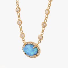 Our 18K Gold Vermeil Blue Opal Necklace is the epitome of elegance, featuring a stunning centerpiece with bezel-set stones along the chain. Perfect as a birthday gift or romantic present, it balances sophistication and charm. PRODUCT DETAILS: • Material: 18K Gold Vermeil • Necklace Lenght: 16 inches + 2 inches extension chain • Adjustable Length • Closure: Spring ring • Chain style: Cable • Style: Minimalist Gold Plated Gemstone Accented Round Necklace, Gold Plated Gemstone Accents Necklace, Gold Plated Gemstone Necklaces, Gold Necklaces With Gemstone Oval Pendant, Diamond Oval Pendant Necklace With Gemstone Accents, Oval Diamond Pendant Necklace With Gemstone Accents, Gold Oval Necklace With Gemstone Accents, Gold Necklace With Oval Gemstone Accents, Oval Gold Necklace With Gemstone Accents