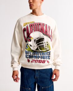 Elevate your game day ensemble with the Men's Arizona Cardinals Graphic Crew Sweatshirt from Abercrombie & Fitch. This piece combines comfort and style, making it a must-have for any fan.

- Size: XL TALL
- Color: Cream
- Material: Cotton, Polyester
- Gender: Male
- Features: Crew neckline, banded hem and cuffs, Arizona Cardinals graphic on the chest

Crafted in our exclusive softAF fleece fabric, this sweatshirt offers an oversized fit that ensures ease of movement and ultimate comfort. Whether Throwback Graphic Print Top For Winter, Throwback Logo Print Sweatshirt For Fall, Throwback Crew Neck Top For Winter, Relaxed Fit Throwback Sweatshirt With Graphic Print, Oversized Long Sleeve Throwback Tops, Varsity Sweats With Graphic Print And Relaxed Fit, Throwback Sports Season Tops With Ribbed Cuffs, Oversized Throwback Top For Fall, Oversized Crew Neck Sweats For Sports Season