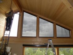 the inside of a house with several windows