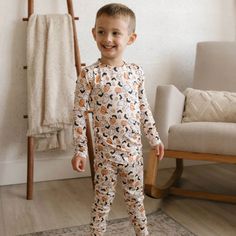 Made in the USA! 👻🎃 Get your little one ready for a spook-tacular Halloween night with this Halloween bamboo toddler pajama! These ultra-soft pajamas are adorned with an adorable Halloween-themed pattern featuring cute ghosts, playful pumpkins, sweet candy corn, and fluttering bats. Crafted from bamboo fabric, these pajamas are not only incredibly soft but also breathable and gentle on sensitive skin, making them perfect for cozy nights of trick-or-treating and festive fun. The whimsical design and comfortable fit make these pajamas a delightful addition to your little one’s Halloween wardrobe. Bamboo is a great choice for babies with eczema and sensitive skin. Bamboo fabric is naturally hypoallergenic, breathable, temperature-regulating, and moisture-wicking, which can help prevent irri Playful Orange Long Sleeve Sleepwear, Playful Orange Sleepwear For Sleepovers, Cute Halloween Onesie For Loungewear, Cute Halloween Pajama Party Sleepwear, Cute Fall Sleepwear, Cute Long Sleeve Halloween Sleepwear, Long Sleeve Halloween Onesie For Loungewear, Playful Orange Sleepwear For Loungewear, Playful Onesie For Fall Loungewear